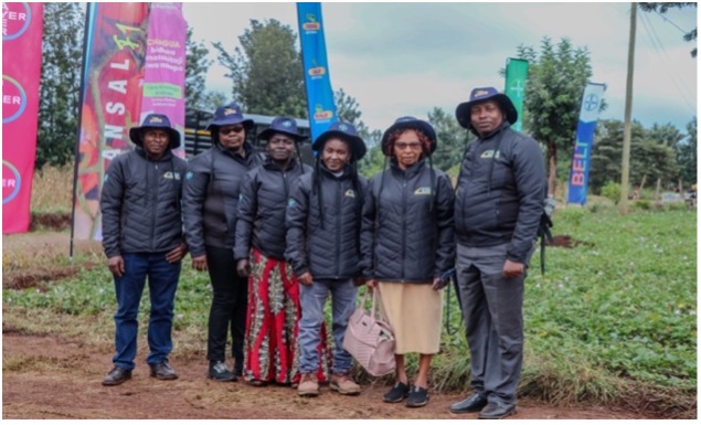 Figure 3: From Left: Michael Wachira, Elizabeth Gacheru, Margaret Kumbe, Gregory Katiso, Jane Njuguna, Simon Kemori pose for a photo at a Farmer Field Day in Kiminja, Kirinyaga on 27th August 2024.| Photo by CGA Communications